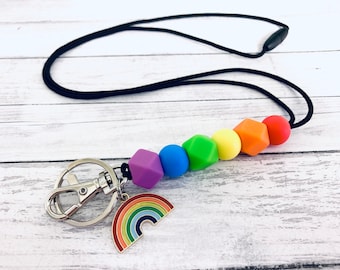 Cordão para crachá de identificação e chaves com arco-íris | Chaveiro com miçangas | Adulto e infantil | Contas de silicone | Cordão para professor | Porta-carteira de identidade | Cordão para presente de enfermeira