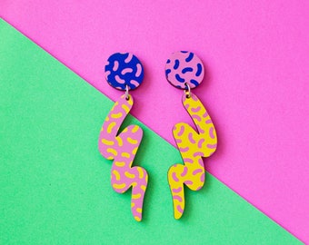 Mr Blobby, 90s pattern, MTV style, colourful mismatched earrings. Jazzy, unique, fun, playful statement jewellery. Plastic Free Printed Wood