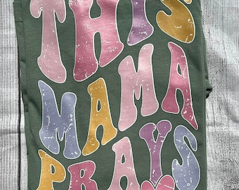 This Mama Prays Christian Shirt • Faith Based Tee for Moms • Inspirational Graphic Tee • Religious Shirt • Prayer Warrior Gift