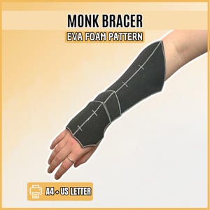 May include: A black EVA foam monk bracer pattern featuring light gray outlines and alignment marks. The text MONK BRACER EVA FOAM PATTERN and A4 + US LETTER are visible. This template is designed for crafting a forearm guard with a pointed wrist section.
