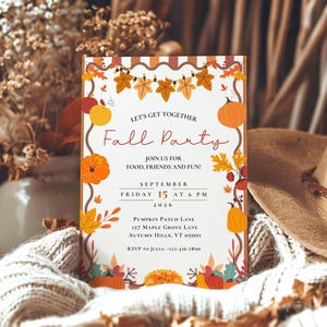 May include: A rectangular invitation card featuring a white background with a decorative border of orange, yellow, and red autumn leaves and pumpkins. The text reads: Let's Get Together Fall Party, Join Us For Food, Friends And Fun, September 15, 2026.