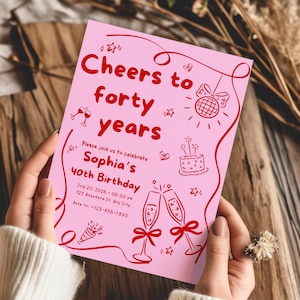 May include: A pink birthday invitation with red text and illustrations. The invitation reads "Cheers to forty years" and announces Sophia's 40th birthday. Includes details like the date, time, and RSVP information. The design features champagne glasses, a cake, and stars.