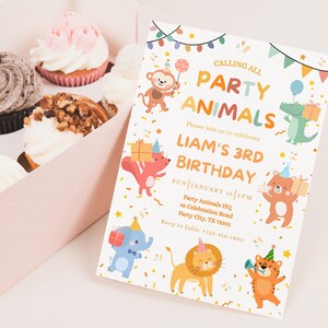 May include: A birthday party invitation with the text "Calling All Party Animals" and "Liam's 3rd Birthday" featuring cartoon animals. Cupcakes in a pink box are in the background. The invitation includes RSVP information.