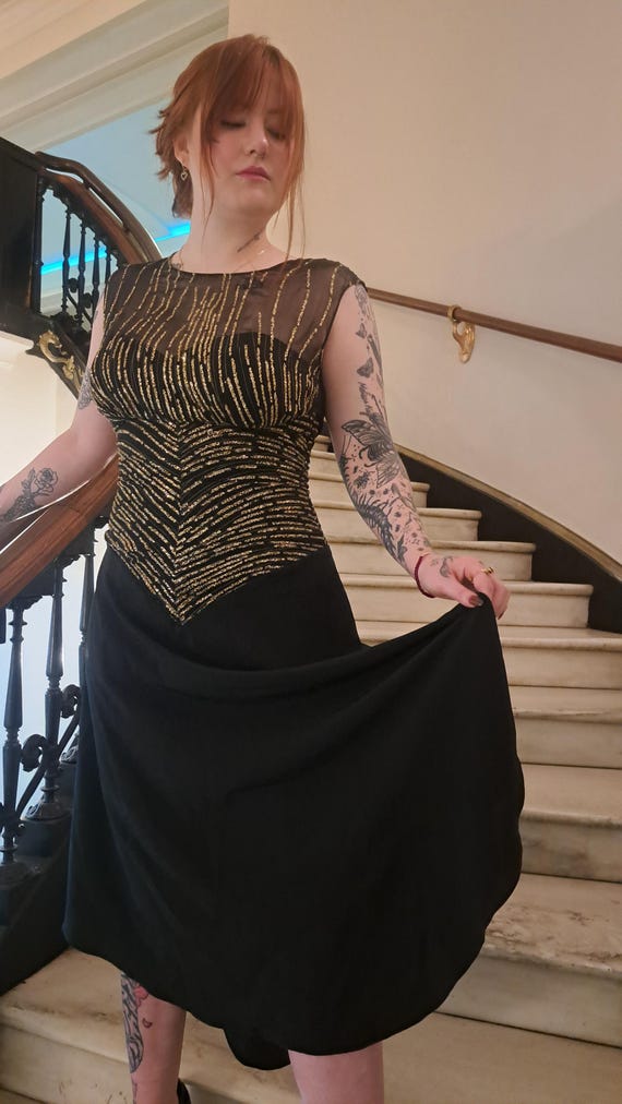 black dress gold zipper back Sleeveless long black Fancy Elegant Woman Dress. Gold Back Zipper And Side Slits