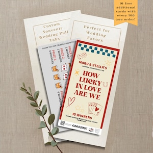 May include: Rectangular wedding pull tab game cards featuring a cream background with red borders and a teal checkered top. The text reads MARU & STELLA'S HOW LUCKY IN LOVE ARE WE, with illustrations of dice, playing cards, a heart, and stars.
