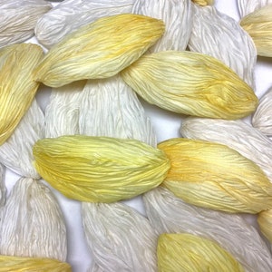 Petals of crashed silk colors white and yellow