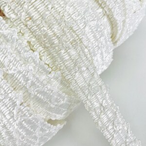 Straw trim made of artificial straw, white color