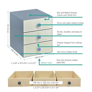 May include: A three-drawer storage unit with a light blue frame and cream-colored drawers. Each drawer has a blue knob. The unit measures 5.54" L x 6.00" W x 6.37" H. The drawers are 5.31" L x 5.91" W x 1.97" H.