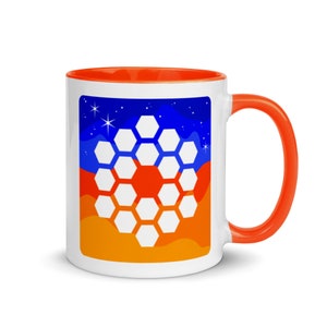 May include: White ceramic mug with an orange rim and handle. The mug features a graphic of a white honeycomb pattern against a blue and orange background.
