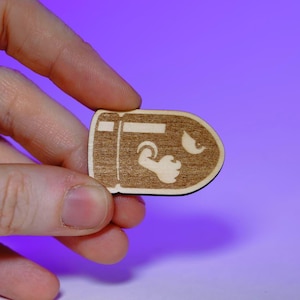 Bullet Bill Wood Pin – Laser Engraved Gaming-Inspired Badge, Retro Gamer Accessory, Handmade Geeky Flair, Nerdy Gift for Gamers & Collectors