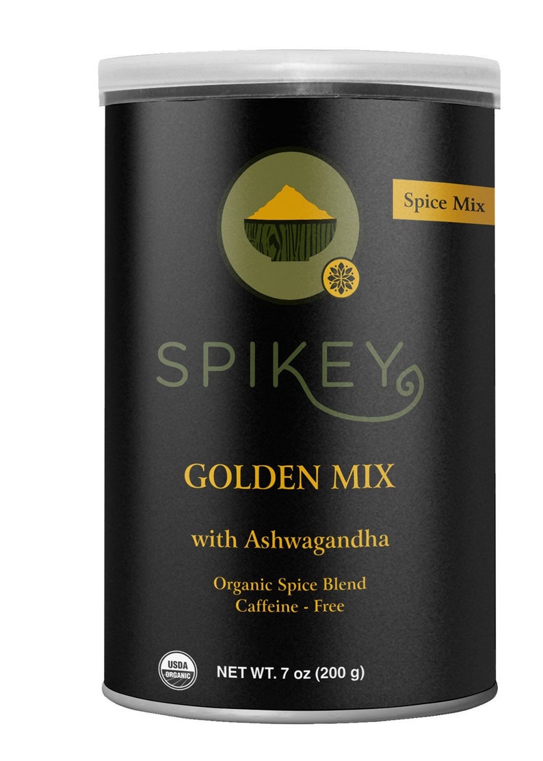 K&ouml;nnte beinhalten: Eine schwarze Dose mit wei&szlig;em Deckel, beschriftet mit "SPIKEY GOLDEN MIX with Ashwagandha Organic Spice Blend Caffeine - Free" und einem USDA Organic Siegel. Die Dose enth&auml;lt 200 Gramm (7 Unzen) Gew&uuml;rzmischung.