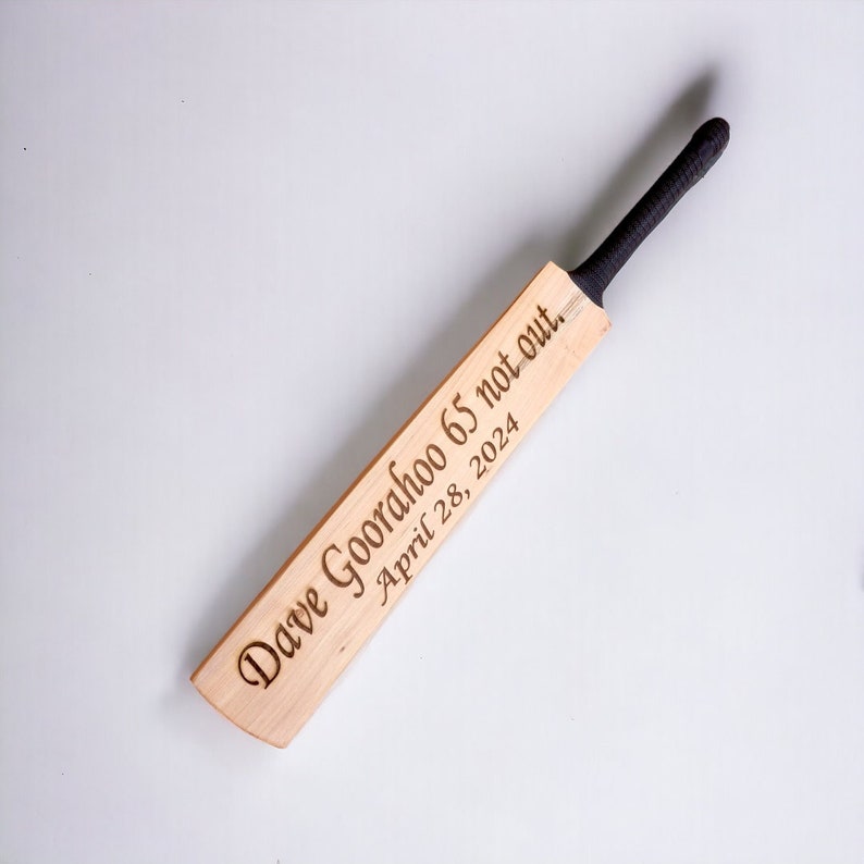 Personalized name laser engraving on cricket bat