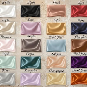 May include: A color chart featuring samples of fabric in various shades. Colors include white, black, peach, rose, ivory, lace, gold, navy, blossom, smoke, light blue, chocolate, mint, ocean, salmon, dark purple, silver, lavender, champagne, and burnt orange.