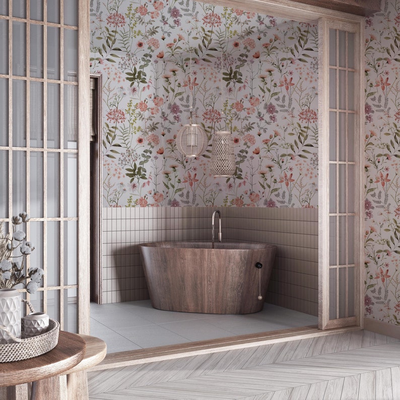May include: A wooden bathtub with a floral wallpaper background. The bathroom has white tile walls and a wooden floor.