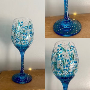 Beautiful hand painted blue flowers medium wine glass. Ideal gift. Quirky and unique.