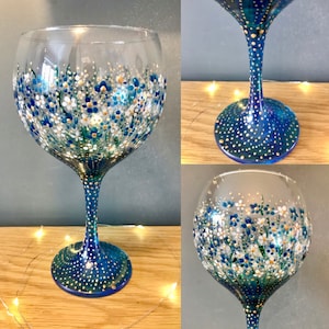 Beautiful hand painted blue flowers gin balloon. Ideal gift. Quirky and unique. Gin glass