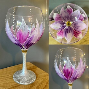 Pink and purple petals. Stunning hand painted gin balloon. Quirky and unique. Ideal gift