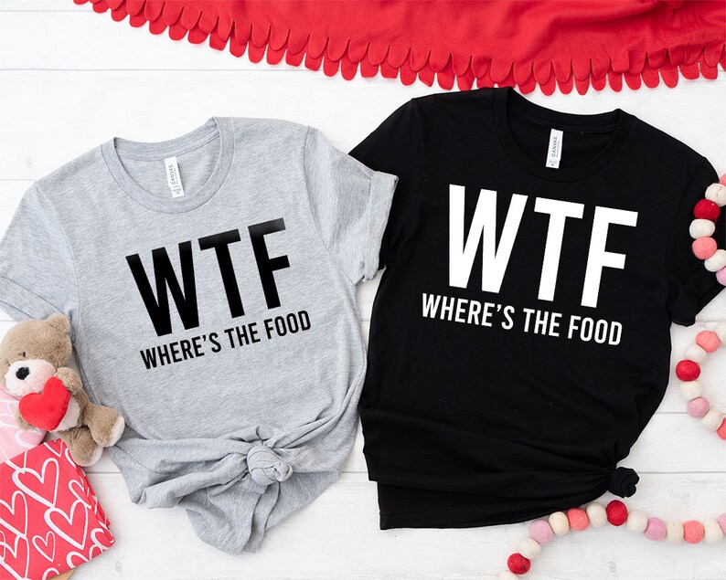 two t - shirts that say wft where's the food and where '