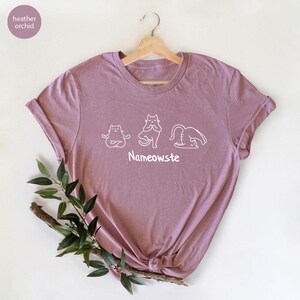 a women's t - shirt with the name of a dog and a cat