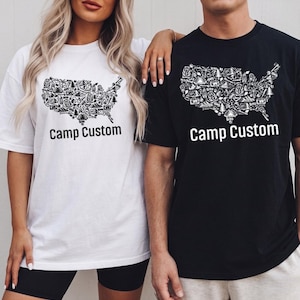 A man and a woman wearing matching t-shirts with a graphic design of the United States of America.