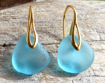 Earrings made of rare turquoise sea glass with gold ear hooks