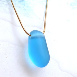 Small pendant with turquoise sea glass with side hole