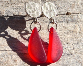 Ear studs with red sea glass and silver colored connectors