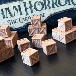 Geüpgradede grondstoftokens voor Arkham Horror: The Card Game