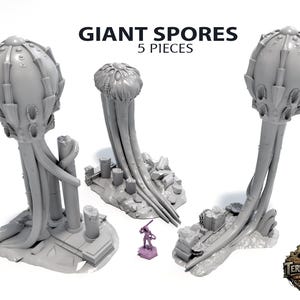 May include: A set of grey plastic miniature terrain pieces labelled "GIANT SPORES, 5 PIECES." The set includes three large spore structures with bulbous tops and multiple tendrils, and two smaller terrain pieces. A miniature figure is included for scale.