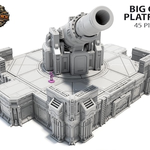 May include: A gray Big Gun Platform model with a large cannon, a small figure, and the text "BIG GUN PLATFORM 45 PIECES". The platform has a detailed, futuristic design, suitable for tabletop gaming.