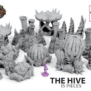 May include: A set of 15 grey terrain pieces for tabletop gaming, featuring organic-looking structures, such as coral-like formations and bulbous shapes. A small purple figure is positioned among the pieces. The text "THE HIVE" and "15 PIECES" are visible.