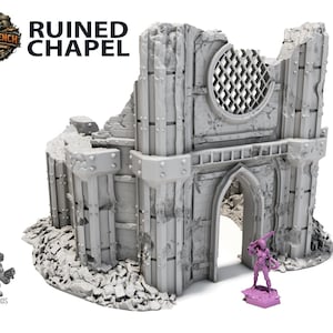 May include: A grey miniature model of a ruined chapel, ideal for tabletop gaming. The model has a weathered, distressed design with visible damage and a circular window. A small, pink figurine stands near the chapel's entrance. The text "RUINED CHAPEL" is visible.