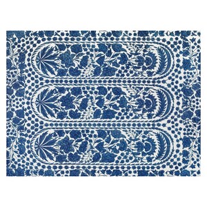 May include: A rectangular textile with a repeating floral pattern in shades of blue on a white background. The design features three elongated oval panels filled with flowers and leaves, framed by decorative borders. The overall aesthetic is reminiscent of traditional block printing.