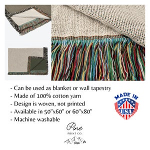 May include: A woven throw blanket with a fringe border in various colors, including red, green, blue, and yellow. The blanket is made of 100% cotton yarn and is available in two sizes: 50"x60" or 60"x80". The blanket is machine washable and can be used as a blanket or wall tapestry. The text "Made in USA" is visible in the image.