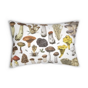 May include: A white pillow with a colorful pattern of various types of mushrooms. The mushrooms are drawn in a vintage style and include different colors, shapes, and sizes.