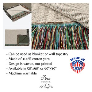 May include: A woven throw blanket with a fringe border in various colors, including red, green, blue, and yellow. The blanket is made of 100% cotton yarn and is available in two sizes: 50"x60" or 60"x80". The blanket is machine washable. The image also includes the text "Made in USA" and "Pine Print Co."