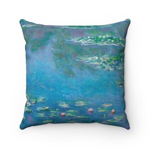 May include: A square throw pillow with a blue and green water lily painting. The painting features a blue background with green lily pads and pink flowers.