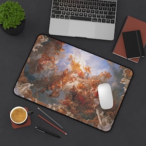 May include: A mouse pad featuring a detailed reproduction of a Renaissance-era painting depicting a scene of angels and figures in the clouds. The painting is in shades of blue, white, gold, and red.