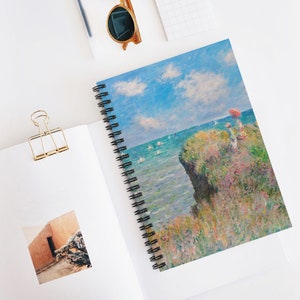 May include: A painting of a seascape with a cliff in the foreground. The cliff is covered in green grass and flowers. Two people are standing on the cliff, looking out at the sea. The sea is a light blue color and there are white sailboats in the distance. The sky is a light blue color with white clouds.