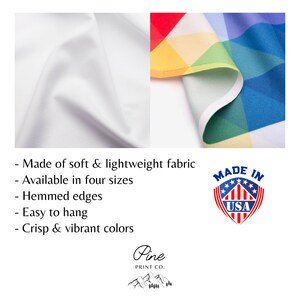 May include: A close-up of a white fabric backdrop with a colorful geometric pattern fabric draped over it. The fabric is made in the USA and features crisp, vibrant colors. The text "Made in USA" is displayed in a red, white, and blue shield.