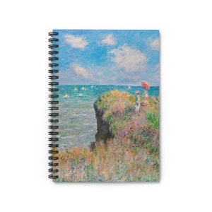 May include: A painting of a seascape with a rocky cliff and two figures standing on top. The figures are wearing white clothing and one is holding a red umbrella. The sea is a light blue color and there are white sailboats in the distance. The sky is a light blue color with white clouds.