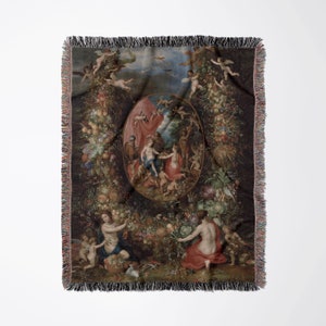 May include: A tapestry woven with a colorful scene of a central oval frame depicting a group of people in a garden setting. The frame is surrounded by a wreath of fruits, vegetables, and flowers. The tapestry has a dark background and is framed with a black border.
