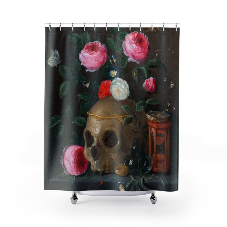 May include: A still life painting depicting a human skull adorned with a gold crown, surrounded by pink and white roses, a small bird's nest, and an hourglass. The background is a dark brown.