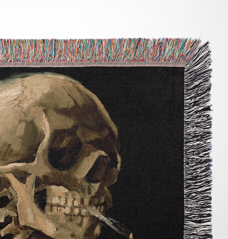 a painting of a skull with a cigarette in its mouth