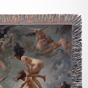 May include: A tapestry woven with a detailed image of a group of nude figures flying through the air. The figures are depicted in a swirling, dynamic composition against a backdrop of clouds and a dark sky. The tapestry has a black fringe border.