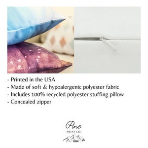 May include: Two decorative throw pillows with a watercolor design. The pillows are made of soft, hypoallergenic polyester fabric and have a concealed zipper. The pillows are printed in the USA and include 100% recycled polyester stuffing.