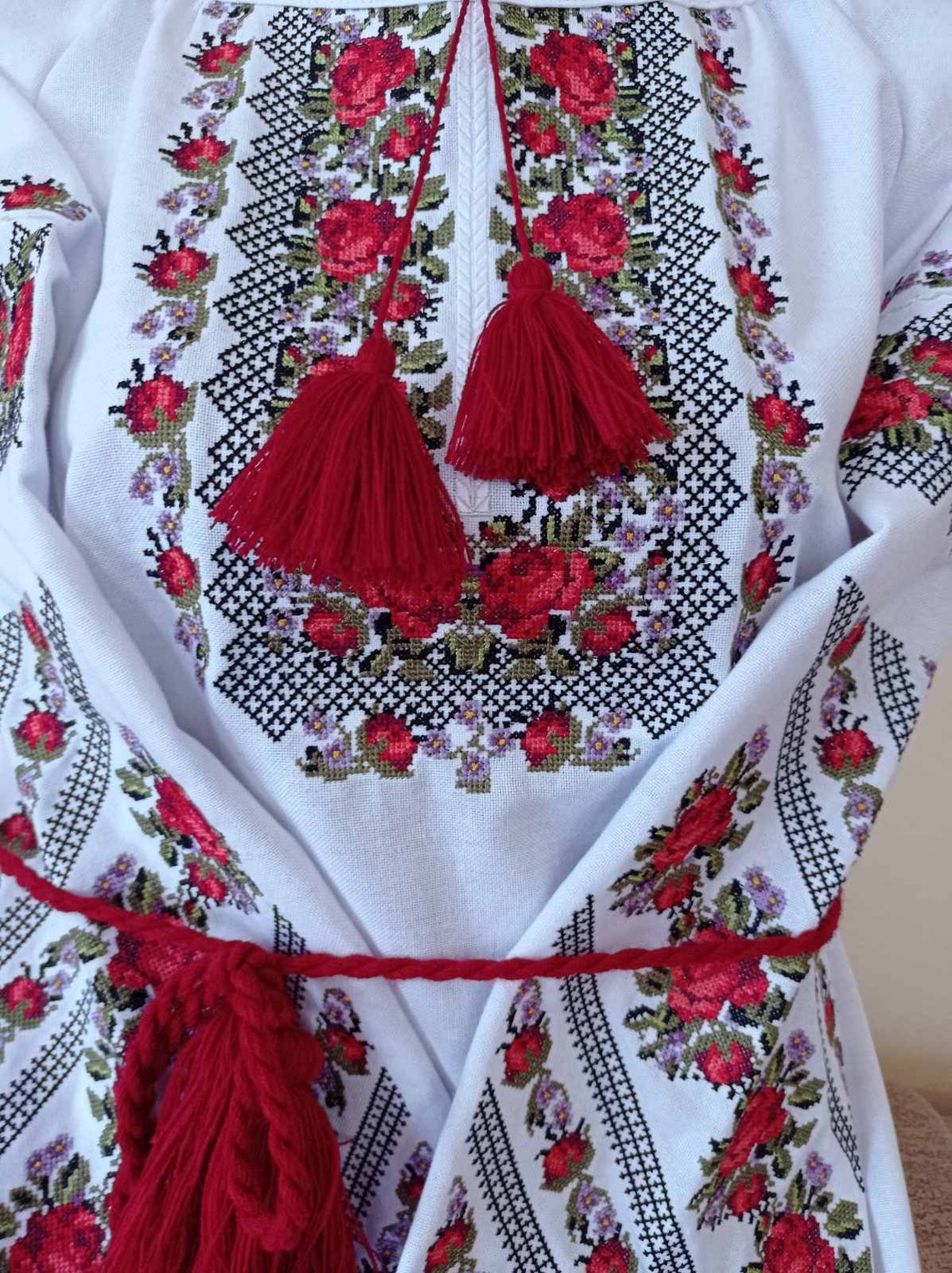 white blouse with roses