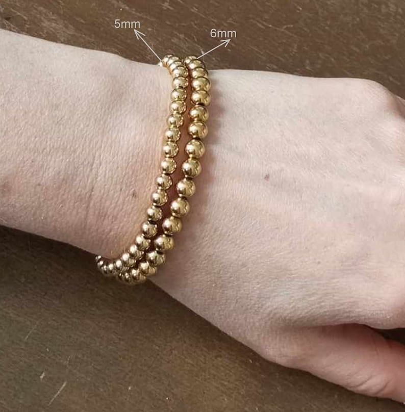 Bracelets perles élastiques acier inoxydable dorés / argentés femme image 6