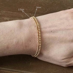 Braccialetti da donna con perline elastiche in acciaio inossidabile oro/argento immagine 10