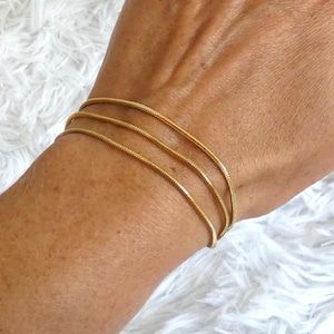Women&#39;s 3-row steel bracelet, multiple bracelets in gold-plated stainless steel, gold